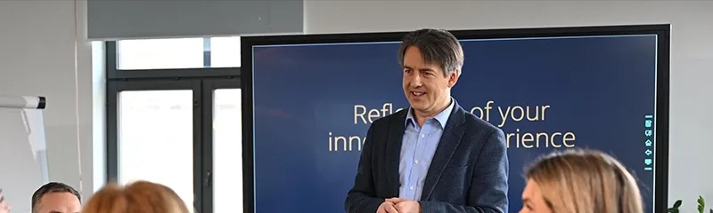 Masters lecturer in classroom